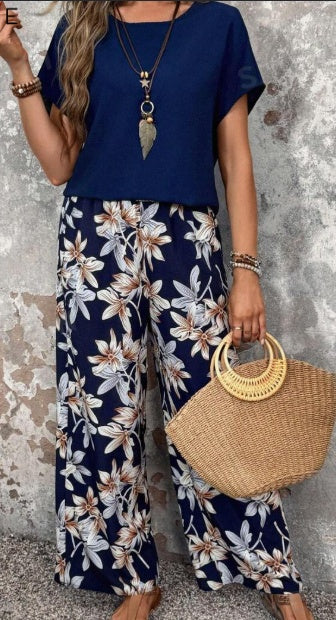 Women Solid Color Round Neck Short Sleeve Top And Flower Print Wide Leg Pants Set For Summer Two Piece Outfits